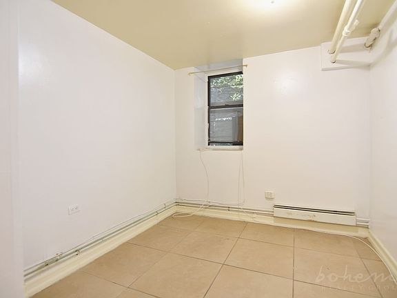 3rd image of 141 Edgecombe Ave #Basement