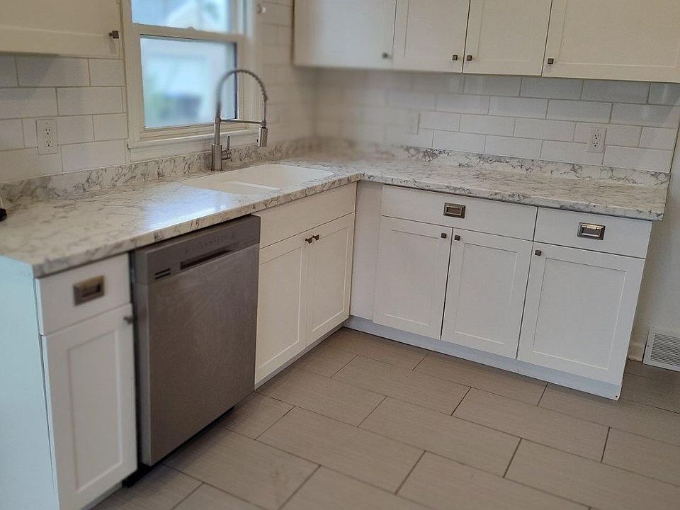 Dishwasher and Sink COUNTER TOP AND CABINETS
