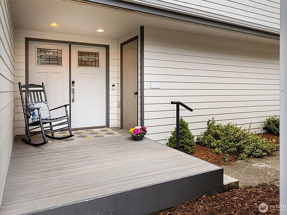 Covered entrance with double doors welcomes you inside. Utility closet is on the right.>