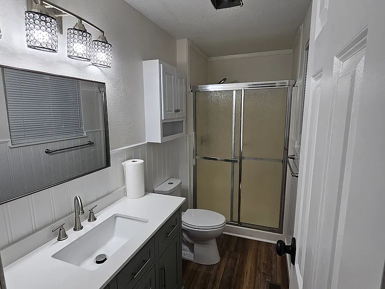 Primary bathroom with new cabinets, again pretty much everything.