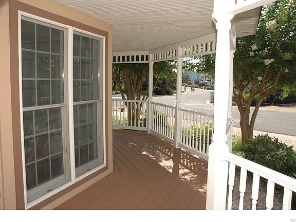 Plenty of room of the porch to enjoy sitting in the shade and enjoying the outside.