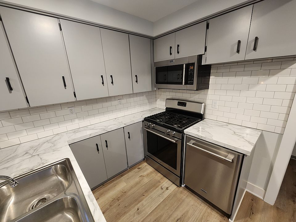 Updated Kitchen with dishwasher and stainless appliances.