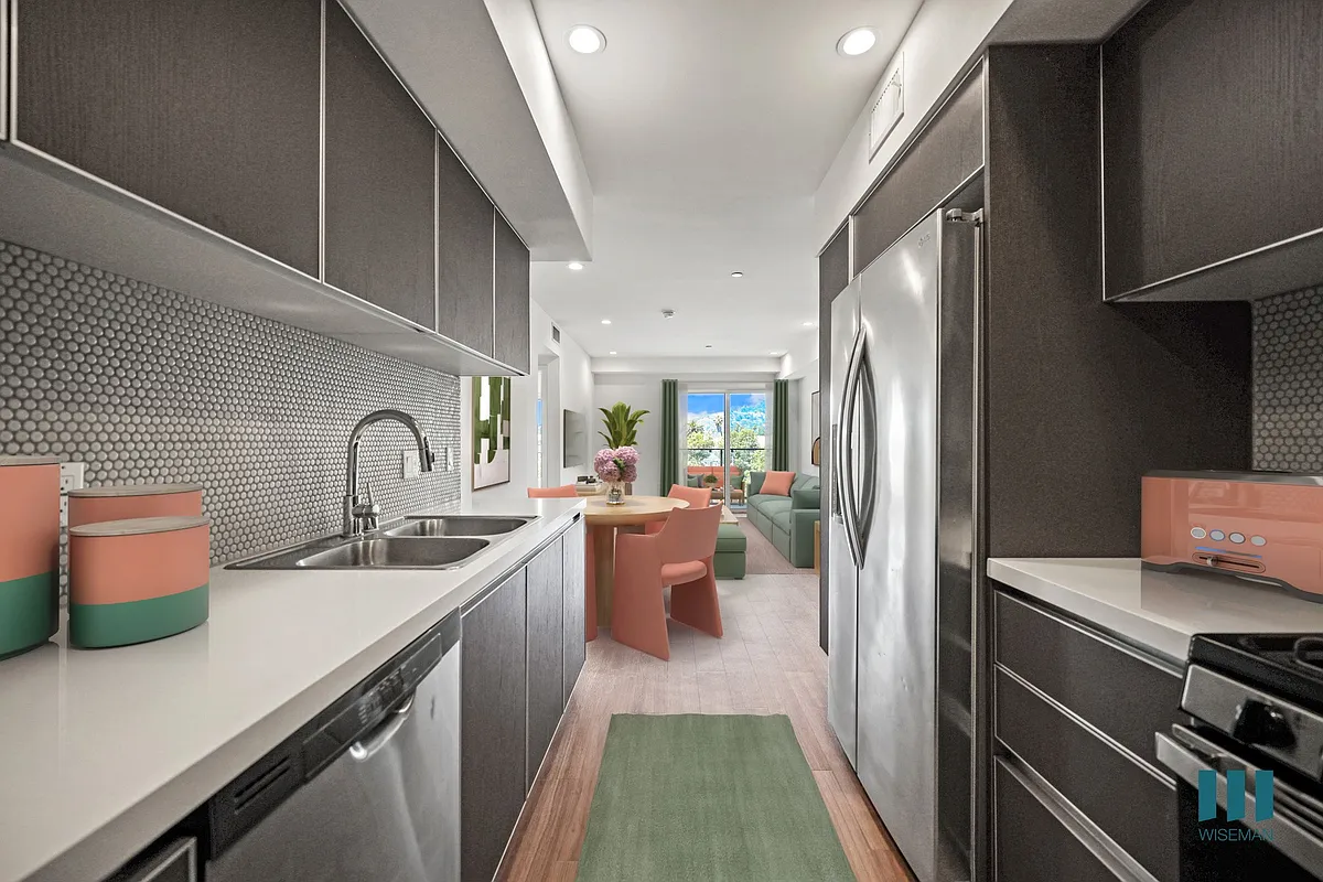 Kitchen with Energy-Efficient Appliances and Ample Cabinet Storage - Sunset Rise by Wiseman