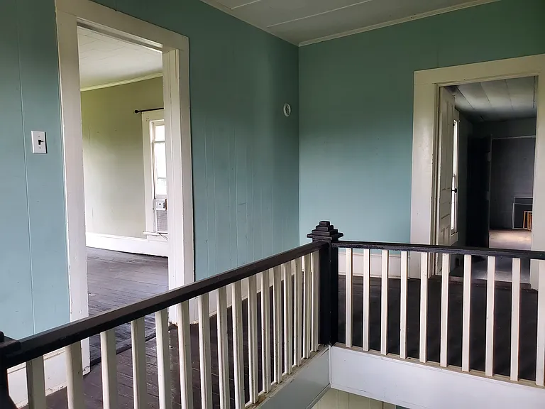 Top of Stairway, showing master bedroom and bedroom #3 entrys
