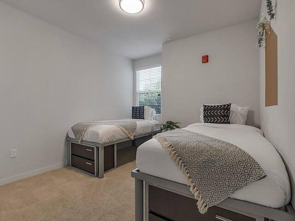 Room for 2! Bunk up in this room with two twin-size beds.