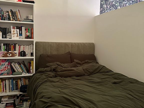 sleeping area with full sized bed