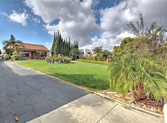 Secluded, long, circular driveway. Front of your home.