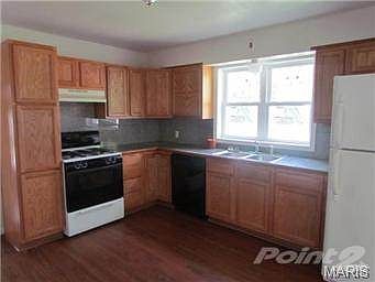 Nice updated kitchen with ceramic tile counter tops.