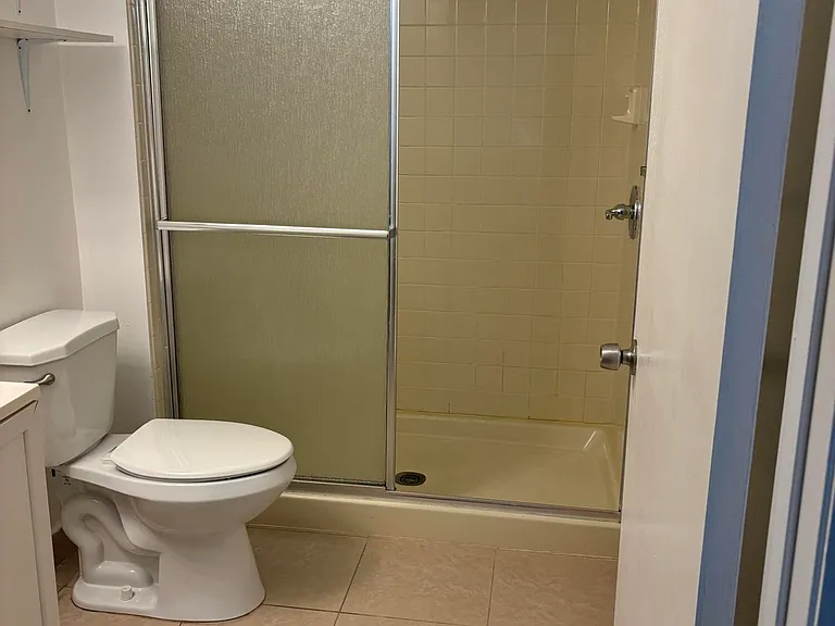 9033 Wiles Rd #102 — Photo 8