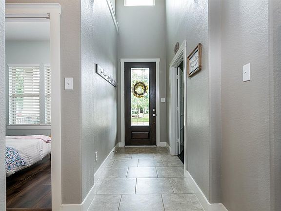 Natural light just flows into the space through the glass front door and overhead picture window!