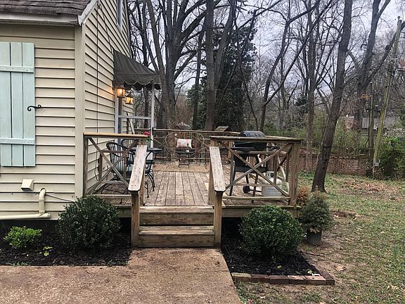 Deck with seating and dining area