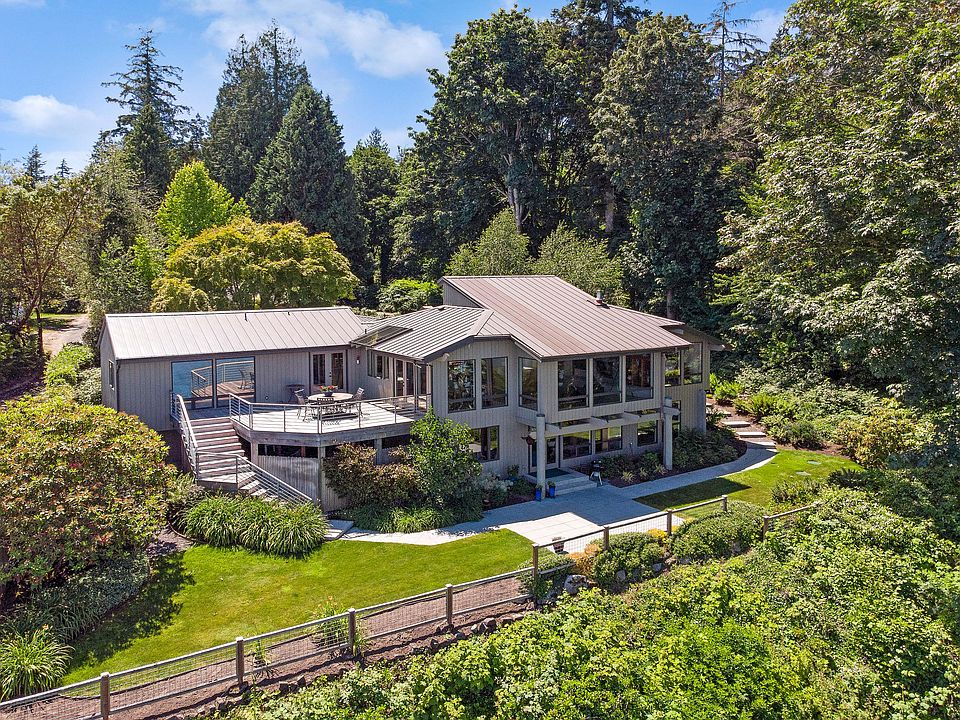 Stunning NW Contemporary style set overlooking Yeomalt Beach.