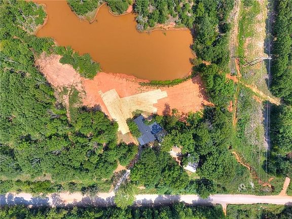 Drone view of the pond and home.  A survey is scanned into docs.