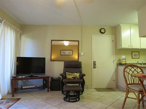 Front door opens to great room with tile floor perfect for a home by the beach