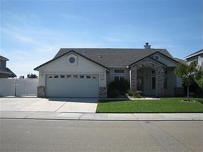 Wonderful single story with RV access.