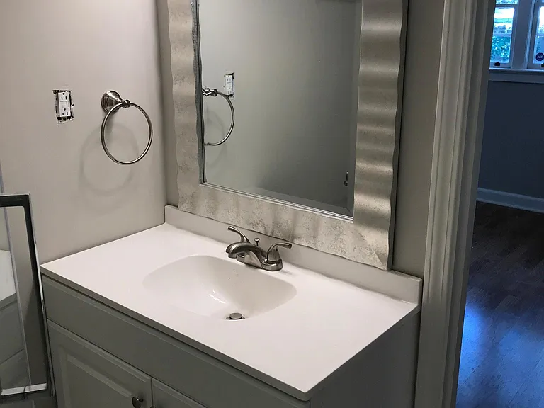 New vanity and mirror in master bath