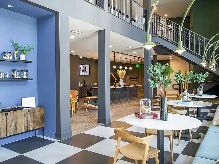 Inspiring and creative game room with fun lighting, rope swings, and more