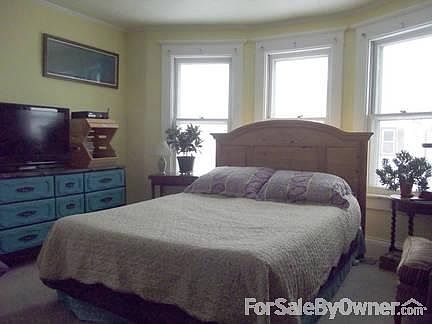 Master Bedroom
						:
						The view from these windows is GLORIOUS in all seasons!