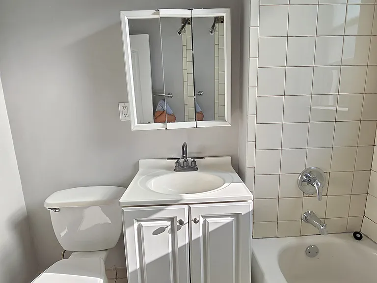 Sunny bathroom with functional window to allow more sunshine and fresh air