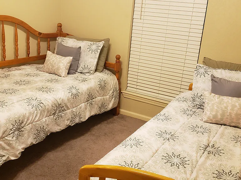 2nd guest bedroom - (sleeps three, has trundle bed as well)