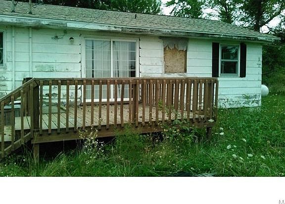 Deck on back of home