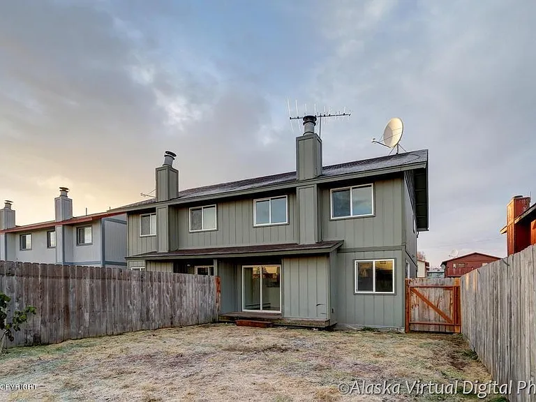 Back of house with Deck