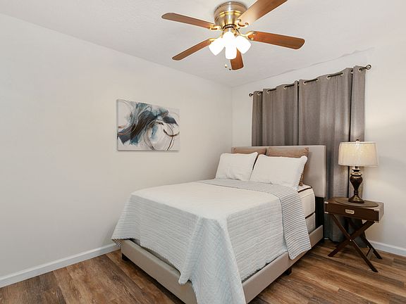 Bed, picture frame, side table are not included.