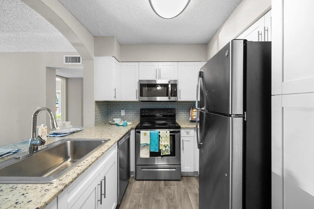 Mosaic Apartments — Photo 3