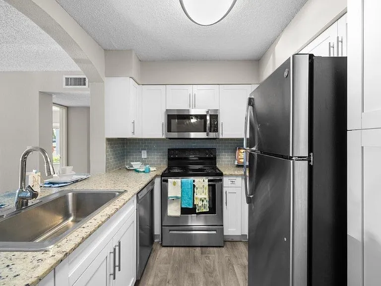 Mosaic Apartments — Photo 3