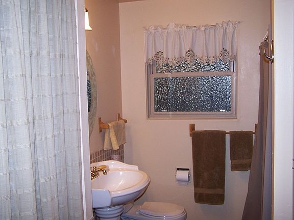 Main Bathroom with updates sink, toilet and fixtures