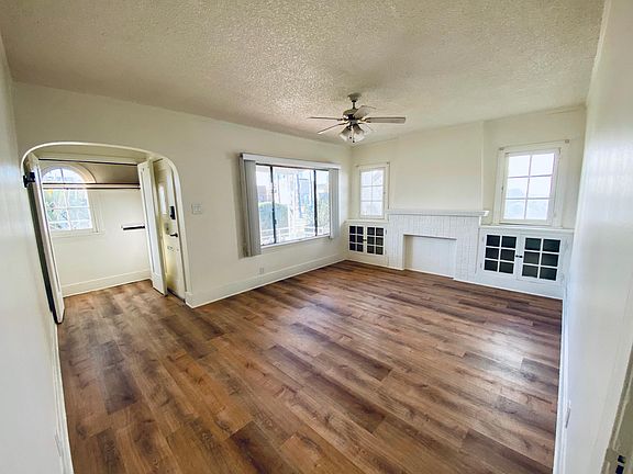 Living room from hallway view. Lots of natural light. Dimensions 16.5x12.