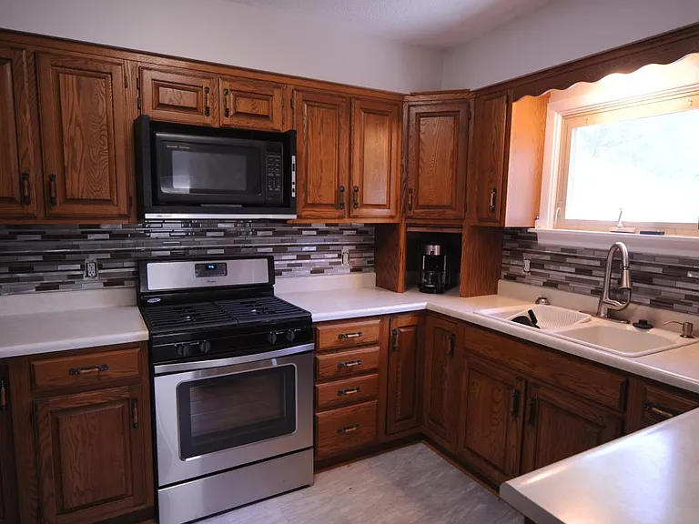 Brand new kitchen stove and backsplash
