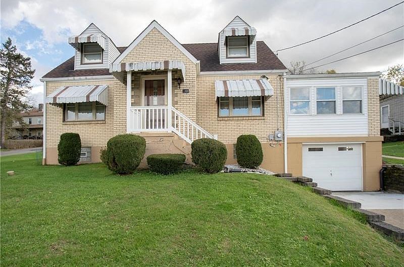 EXTERIOR FRONT VIEW OF CHARMING ALL BRICK CAPE COD HOME.  IMMACULATE, WELL MAINTAINED.  JUST WAITING FOR ITS NEW LOVING OWNER.
