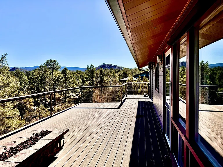 Massive brand new trax deck. Room for dining, lounge chairs, fire pit seating, bbq area and more.