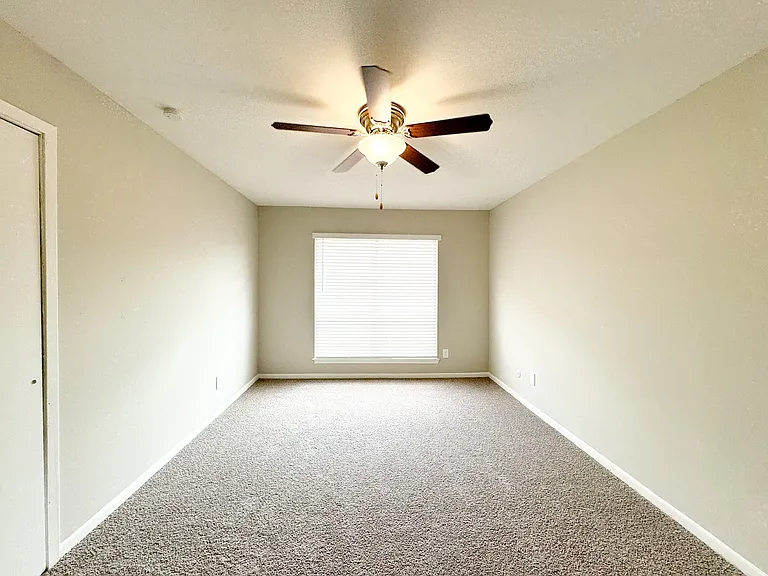 Living room with soft tones and sunlight