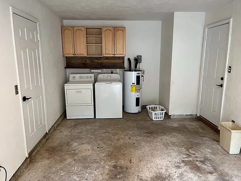 One car garage with opener. Store your car, lawn equipment and or toys.