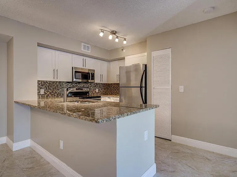 140 Yacht Club Way #206 — Photo 20