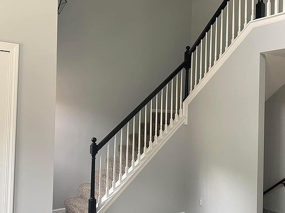 Staircase to upper level bedrooms