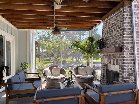 Screened porch w/wood burning fireplace
