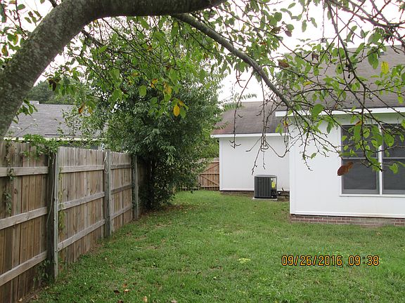 fenced Backyard, new AC/Heat Unit