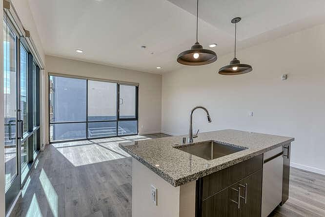 Kitchen island in this light and bright corner unit