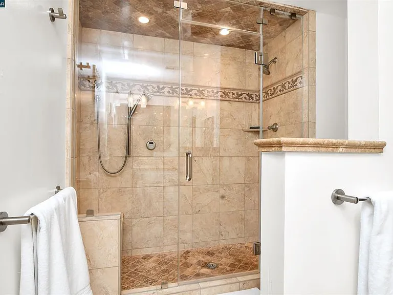 Oversized Custom Travertine Walk-in Shower