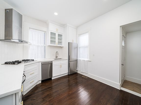 kitchen - fully equipped stainless steel including dishwasher, gas stove w/ hood that vents out, ideal for those who love to cook!