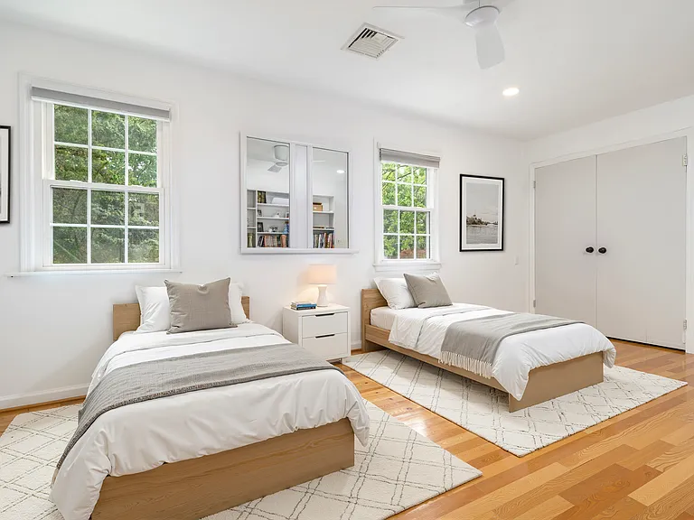 Another of the spacious bedrooms on the second floor. Virtually staged