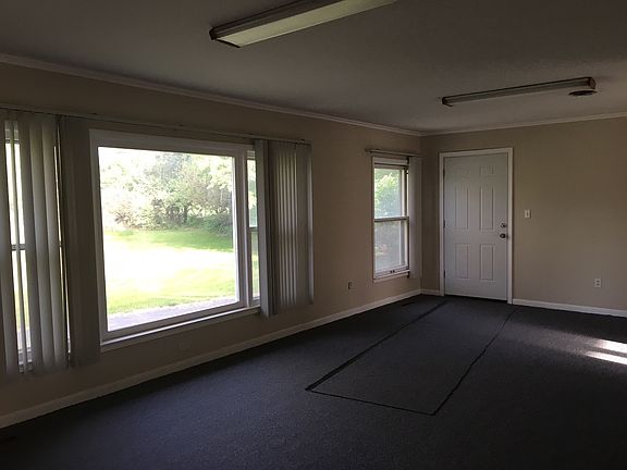 Room 102 - 350 Sqft. Big office space with fireplace. Window