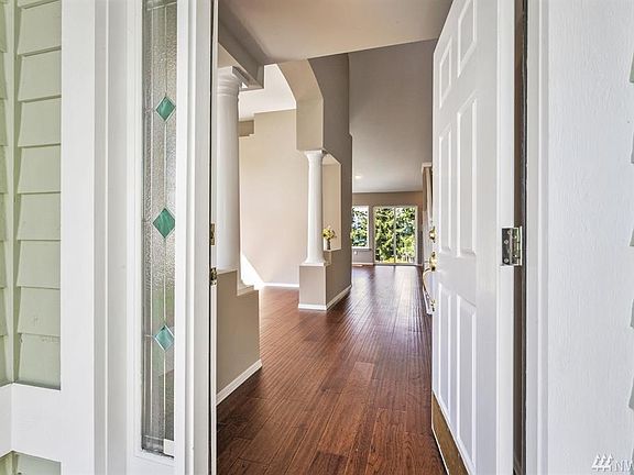 Enter the home and get a peek of the dramatic architectural details that await!