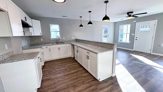 Sunny Yellow Renovated 3-Bedroom Home with Main-Level Primary Suite — Photo 3