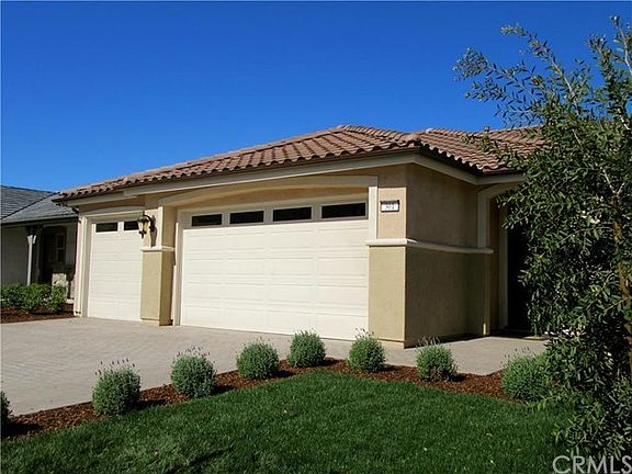 Plan 1 Italianette Elevation with spacious 3-car garage.