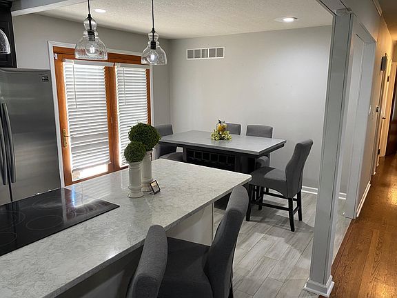 Kitchen and dining area, door to backyard