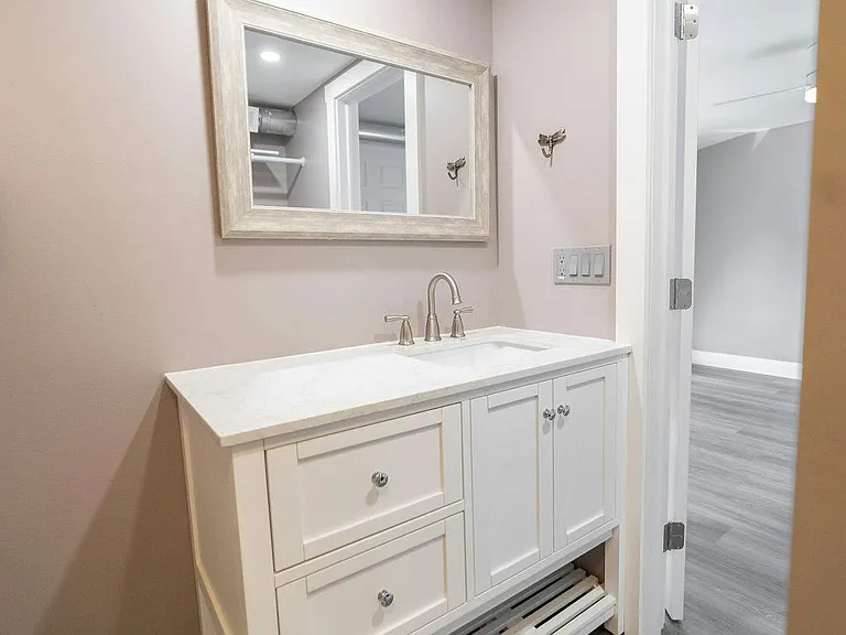 Newly finished bathroom with spacious counter space!